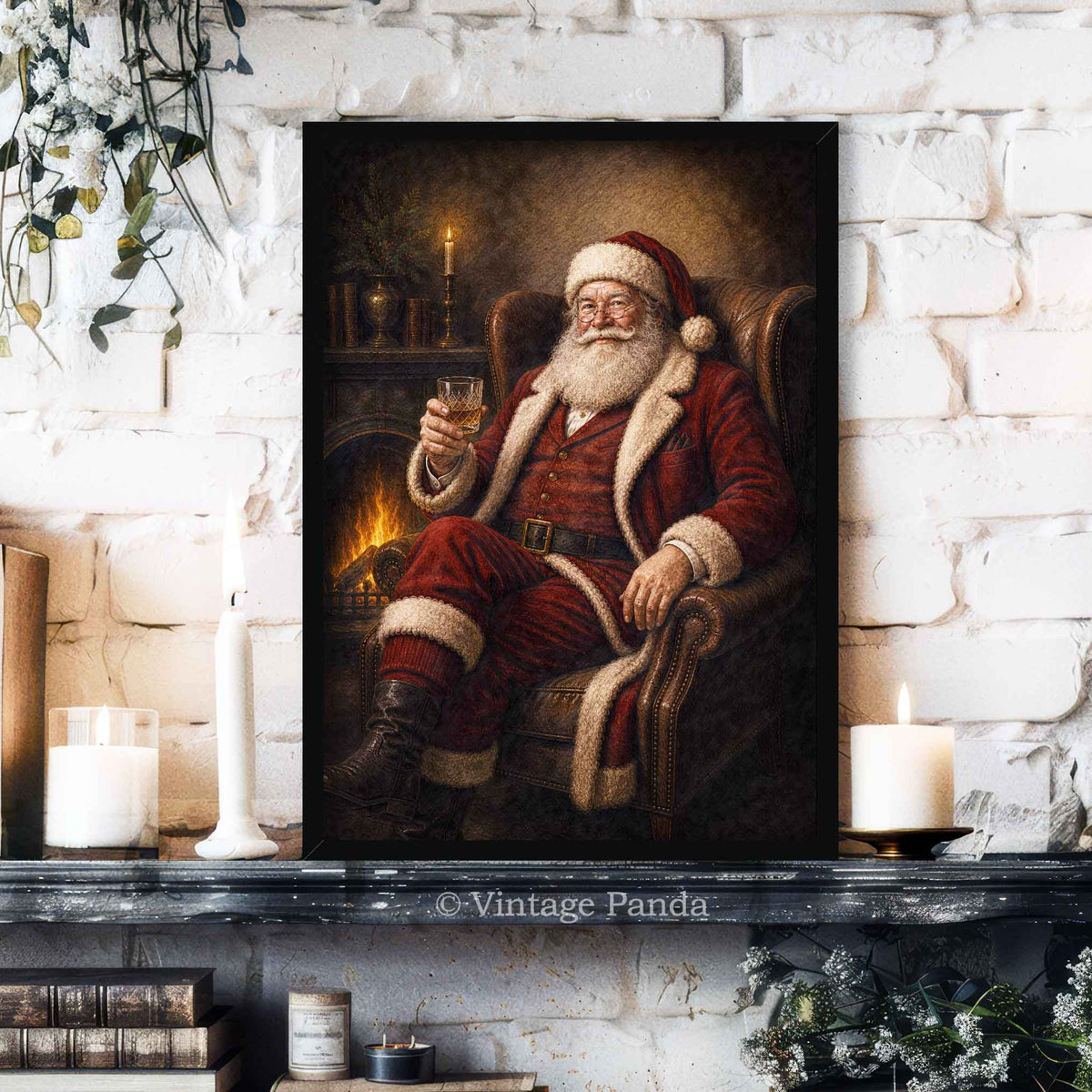 A framed vertical canvas print of a classic Victorian-era Santa Claus sitting by a fireplace and holding a glass, displayed on a dark mantelpiece against a white brick wall decorated with candles, books, and greenery.